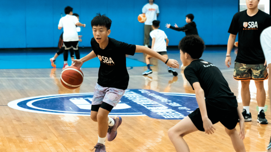 Teenagers playing Basketball
